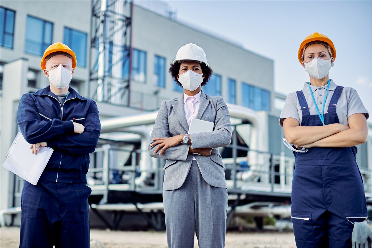 team confident civil engineers with protective face masks construction site (1500 x 1000)